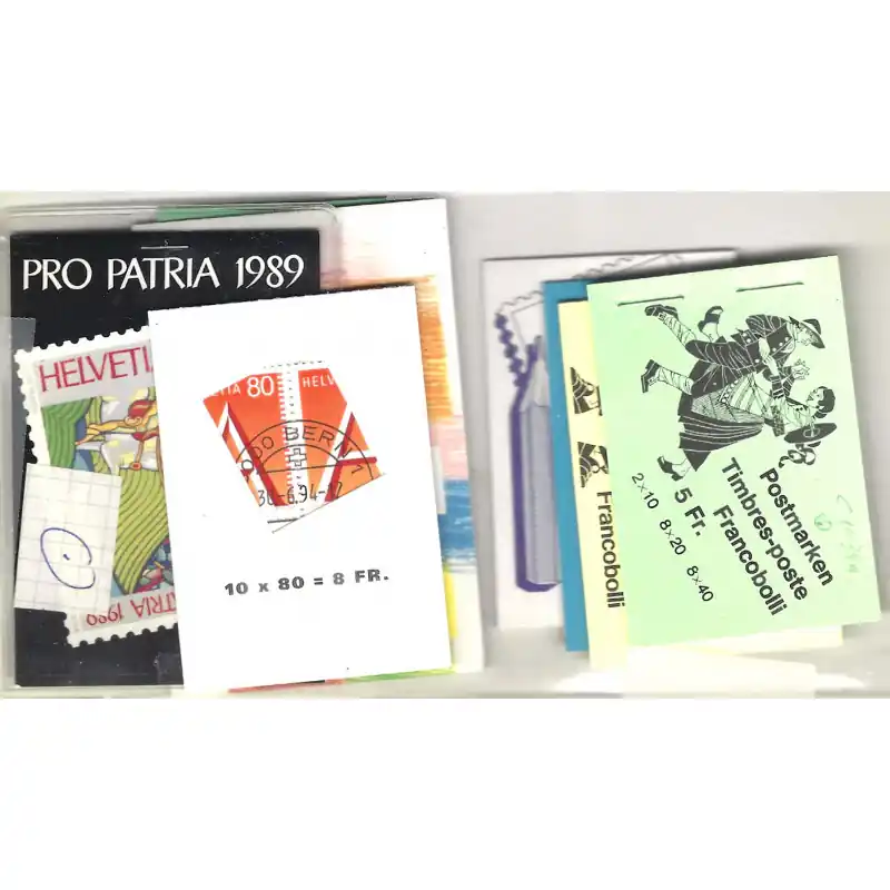 Promotion Suisse lot de 9 carnets de timbres oblitérés premier jour.